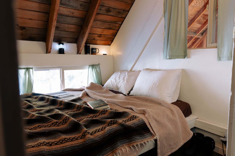 A bed in an efficiency room
