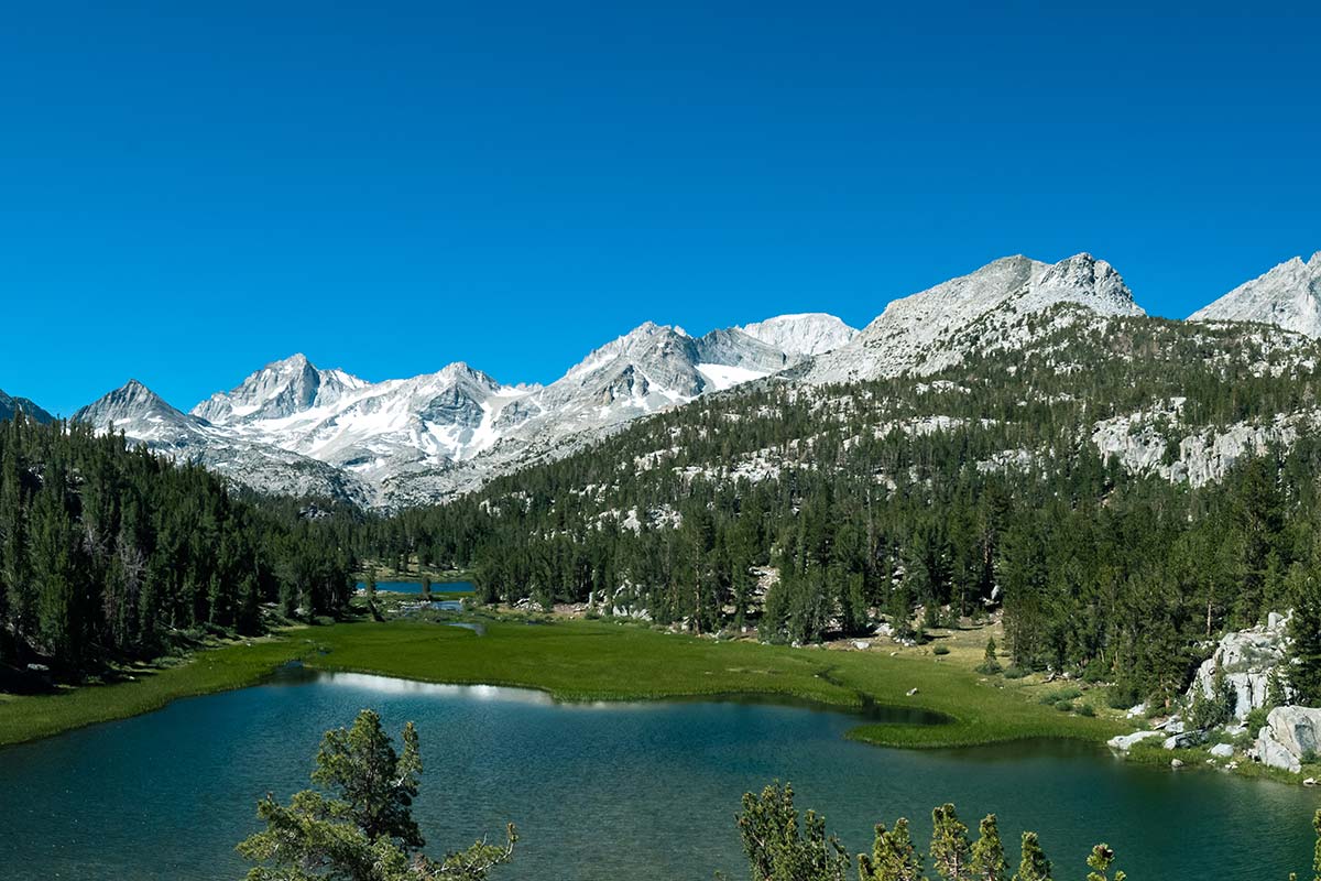 A lake with Sierra Nevada mountains in the distance